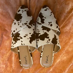 Cow print mules